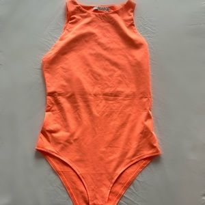 Brand new body suit never worn size Small